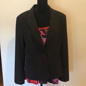 The limited suit jacket and skirt, size large/14